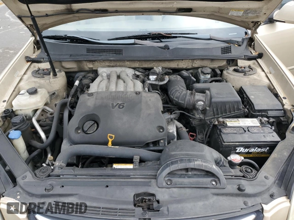 2008 Kia Optima LX z VIN KNAGE124385198719, wystawiony jako Copart lot #55449255 z przebiegiem 156 972 mil mil oraz Szkoda całkowita • Salvage title. Historia ofert i sprzedaży dostępna na DreamBid. Obrazek 11.