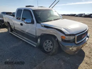 2000 GMC New Sierra 1500 SLE with VIN 2GTEC19T0Y1358568, listed as a Copart auction lot 43400635 with 299,733 mi miles and Salvage Title. Bid and sale history available at carsss.com. Image 4.