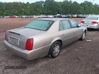 2003 Cadillac DeVille z VIN 1G6KD54Y33U168709, wystawiony jako IAAI lot #42197430 z przebiegiem 287 747 mil mil oraz . Historia ofert i sprzedaży dostępna na DreamBid. Obrazek 4.
