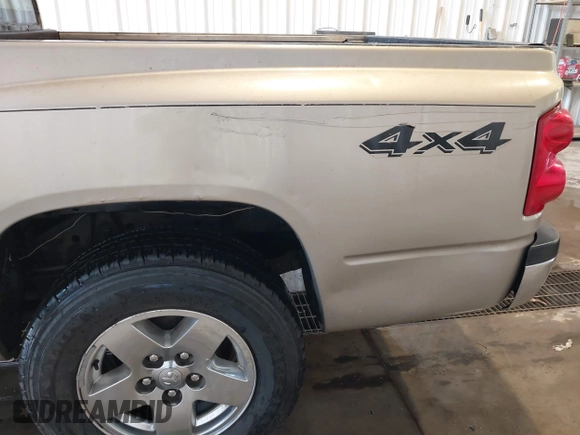 2005 Dodge Dakota Laramie with VIN 1D7HW58N15S159061, listed as a IAAI auction lot 41898306 with 114,288 mi miles and . Bid and sale history available at DreamBid. Image 6.