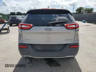 2016 Jeep Cherokee Limited with VIN 1C4PJMDB5GW244734, listed as a Copart auction lot 64608765 with 166,953 mi miles and Salvage title. Bid and sale history available at DreamBid. Image 6.