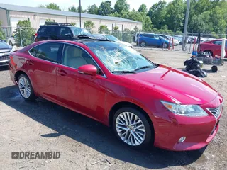 2015 Lexus ES 330 with VIN JTHBK1GG2F2156273, listed as a IAAI auction lot 42611832 with 196,590 mi miles and . Bid and sale history available at DreamBid. Image 1.