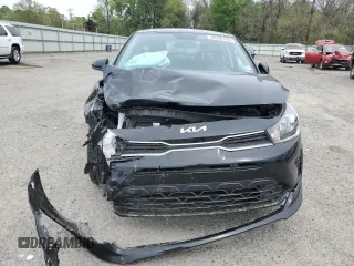 2023 Kia Rio S with VIN 3KPA24AD6PE554264, listed as a Copart auction lot 50908145 with 8,801 mi miles and Salvage Title. Bid and sale history available at carsss.com. Image 5.