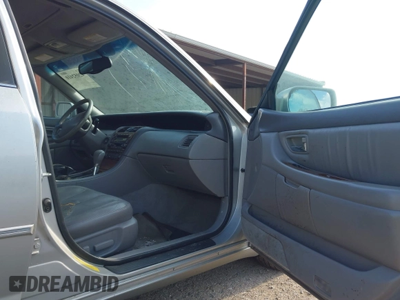 2002 Toyota Avalon XL with VIN 4T1BF28B82U249629, listed as a IAAI auction lot 42052410 with 245,314 mi miles and . Bid and sale history available at DreamBid. Image 5.