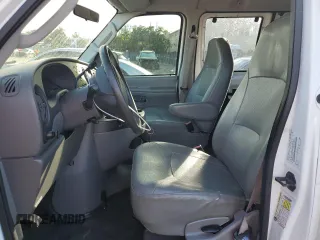 2008 Ford Econoline Passenger XL with VIN 1FBSS31L88DA78242, listed as a Copart auction lot 79951474 with 211,663 mi miles and Salvage Title. Bid and sale history available at DreamBid. Image 7.