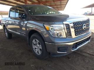 2018 Nissan Titan SV with VIN 1N6AA1EK2JN550903, listed as a IAAI auction lot 42386651 with 100,322 mi miles and . Bid and sale history available at DreamBid. Image 1.