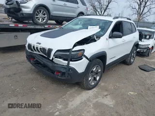 2019 Jeep Cherokee Trailhawk Elite with VIN 1C4PJMBX4KD351261, listed as a IAAI auction lot 41944727 with 97,849 mi miles. Bid and sale history available at carsss.com. Image 18.