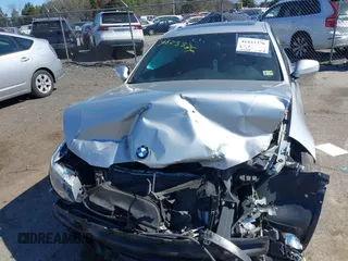 2013 BMW 3 Series 335i xDrive with VIN WBAKF9C56DE860199, listed as a IAAI auction lot 41823376 with Not provided miles and . Bid and sale history available at DreamBid. Image 6.