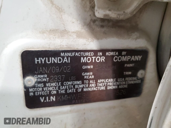 2002 Hyundai Sonata GLS with VIN KMHWF35H12A607526, listed as a Copart auction lot 83826114 with 149,277 mi miles and Clean Title. Bid and sale history available at carsss.com. Image 12.