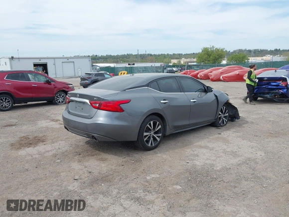 2018 Nissan Maxima SV with VIN 1N4AA6AP4JC377985, listed as a IAAI auction lot 42071678 with 104,326 mi miles and . Bid and sale history available at DreamBid. Image 4.