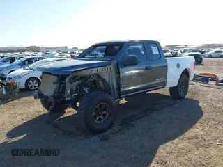 2015 Ford F-150 XL with VIN 1FTEX1CP3FKD43267, listed as a IAAI auction lot 41335186 with 137,766 mi miles. Bid and sale history available at carsss.com. Image 2.