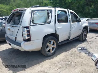 2013 Chevrolet Tahoe LT with VIN 1GNSCBE07DR372979, listed as a IAAI auction lot 42281955 with 214,737 mi miles and . Bid and sale history available at DreamBid. Image 4.