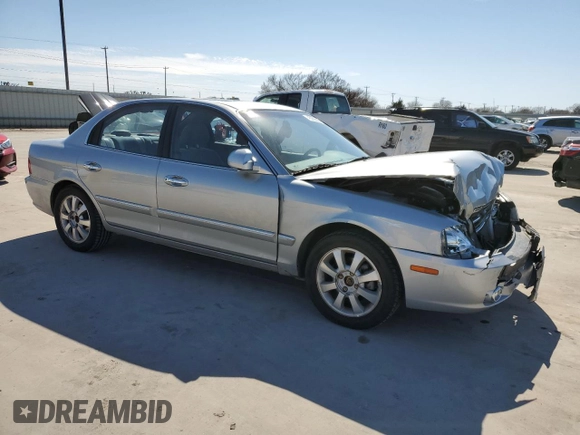 2005 Kia Optima LX z VIN KNAGD128055433689, wystawiony jako Copart lot #46909305 z przebiegiem 27 609 mil mil oraz Szkoda całkowita • Salvage title. Historia ofert i sprzedaży dostępna na DreamBid. Obrazek 4.