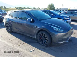 2020 Tesla Model Y Long Range with VIN 5YJYGDEF9LF011555, listed as a IAAI auction lot 40429999 with 63,003 mi miles and . Bid and sale history available at DreamBid. Image 1.