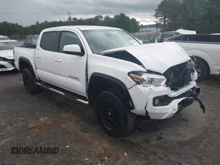 2021 Toyota Tacoma SR5 z VIN 3TMAZ5CN8MM157177, wystawiony jako IAAI lot #42268043 z przebiegiem 24 442 mil mil oraz . Historia ofert i sprzedaży dostępna na DreamBid. Obrazek 1.