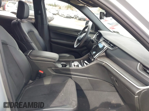 2023 Jeep Grand Cherokee Laredo with VIN 1C4RJHAG2PC660418, listed as a IAAI auction lot 41693879 with 4,295 mi miles and . Bid and sale history available at DreamBid. Image 5.