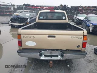 1999 Toyota Tacoma with VIN 4TAVL52N4XZ524059, listed as a IAAI auction lot 41761806 with 214,425 mi miles and . Bid and sale history available at DreamBid. Image 16.