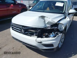 2019 Volkswagen Tiguan SE with VIN 3VV2B7AX8KM193166, listed as a IAAI auction lot 41957720 with 61,981 mi miles and . Bid and sale history available at DreamBid. Image 6.