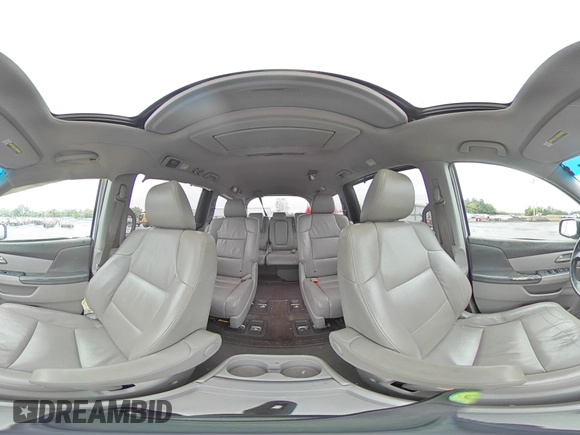 2011 Honda Odyssey Touring with VIN 5FNRL5H99BB021223, listed as a Copart auction lot 61171775 with 194,029 mi miles and Salvage title. Bid and sale history available at DreamBid. Image 16.