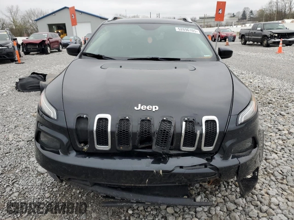 2015 Jeep Cherokee Latitude with VIN 1C4PJLCB9FW706934, listed as a Copart auction lot 52696105 with 125,205 mi miles and Salvage Title. Bid and sale history available at DreamBid. Image 5.
