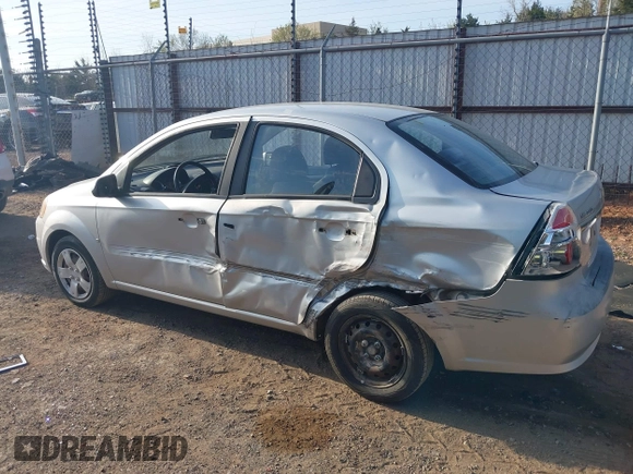 2009 Chevrolet Aveo 1LT z VIN KL1TD56E49B372791, wystawiony jako IAAI lot #41890124 z przebiegiem 118 648 mil mil oraz . Historia ofert i sprzedaży dostępna na DreamBid. Obrazek 14.