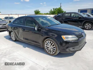 2013 Volkswagen Jetta TDI w/Premium with VIN 3VWLL7AJ7DM376862, listed as a Copart auction lot 59192445 with 163,224 mi miles and Salvage title. Bid and sale history available at DreamBid. Image 4.