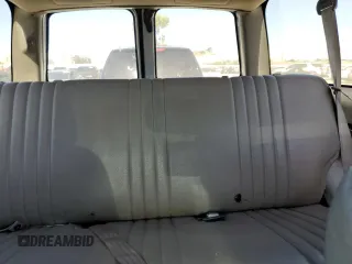 1997 Chevrolet Tahoe z VIN 3GNEK18R1VG112163, wystawiony jako Copart lot #58631925 z przebiegiem 213 262 mil mil oraz Tytuł czysty. Historia ofert i sprzedaży dostępna na DreamBid. Obrazek 10.