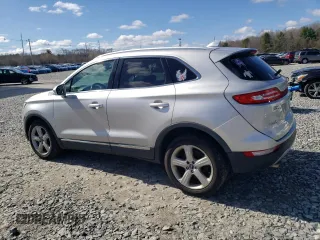 2016 Lincoln MKC Premier with VIN 5LMCJ1D99GUJ10887, listed as a Copart auction lot 49863635 with 135,045 mi miles and Salvage Title. Bid and sale history available at DreamBid. Image 2.