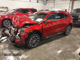 2024 Cadillac XT4 AWD Sport z VIN 1GYFZFR42RF154352, wystawiony jako IAAI lot #41249916 z przebiegiem 27 378 mil mil oraz . Historia ofert i sprzedaży dostępna na DreamBid. Obrazek 17.