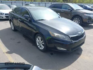 2013 Kia Optima EX with VIN 5XXGN4A79DG174558, listed as a IAAI auction lot 42078646 with 163,161 mi miles. Bid and sale history available at carsss.com. Image 1.