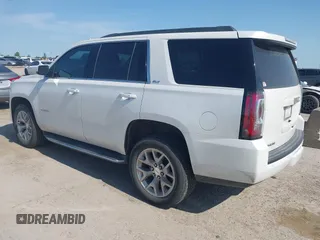 2017 GMC Yukon SLT z VIN 1GKS1BKC2HR378437, wystawiony jako IAAI lot #41923260 z przebiegiem 127 356 mil mil oraz . Historia ofert i sprzedaży dostępna na DreamBid. Obrazek 3.