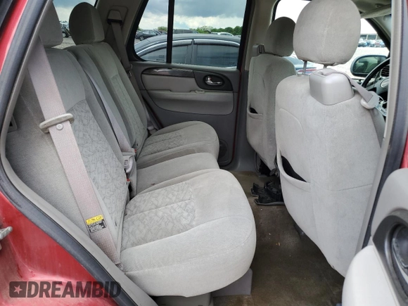 2005 GMC Envoy SLE z VIN 1GKDT13S752203494, wystawiony jako Copart lot #56150605 z przebiegiem 243 475 mil mil oraz Szkody całkowita. Historia ofert i sprzedaży dostępna na DreamBid. Obrazek 10.