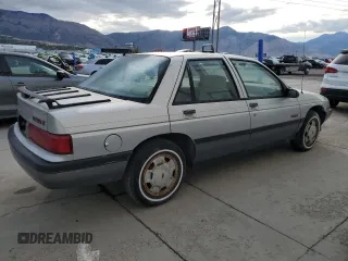 1990 Chevrolet Corsica z VIN 1G1LT54T5LY175073, wystawiony jako Copart lot #71889604 z przebiegiem 111 578 mil mil oraz Tytuł czysty. Historia ofert i sprzedaży dostępna na DreamBid. Obrazek 3.