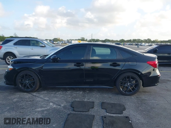 2022 Honda Civic Sport z VIN 2HGFE2F53NH569990, wystawiony jako IAAI lot #41944635 z przebiegiem 20 935 mil mil oraz . Historia ofert i sprzedaży dostępna na DreamBid. Obrazek 15.