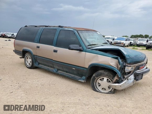 1995 GMC Suburban z VIN 1GKEC16K9SJ708907, wystawiony jako Copart lot #56415125 z przebiegiem 251 343 mil mil oraz Szkoda całkowita • Salvage title. Historia ofert i sprzedaży dostępna na DreamBid. Obrazek 4.