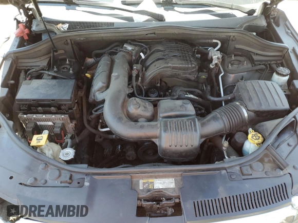 2015 Dodge Durango Limited z VIN 1C4RDJDG9FC240552, wystawiony jako Copart lot #58221145 z przebiegiem 121 882 mil mil oraz Szkoda całkowita • Salvage title. Historia ofert i sprzedaży dostępna na DreamBid. Obrazek 12.