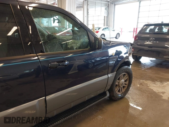 2003 Mercury Mountaineer Convenience z VIN 4M2ZU86W03UJ16828, wystawiony jako IAAI lot #41580919 z przebiegiem 148 968 mil mil oraz . Historia ofert i sprzedaży dostępna na DreamBid. Obrazek 20.
