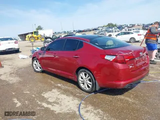 2012 Kia Optima EX with VIN 5XXGN4A72CG043809, listed as a IAAI auction lot 41920663 with 273,509 mi miles. Bid and sale history available at carsss.com. Image 3.