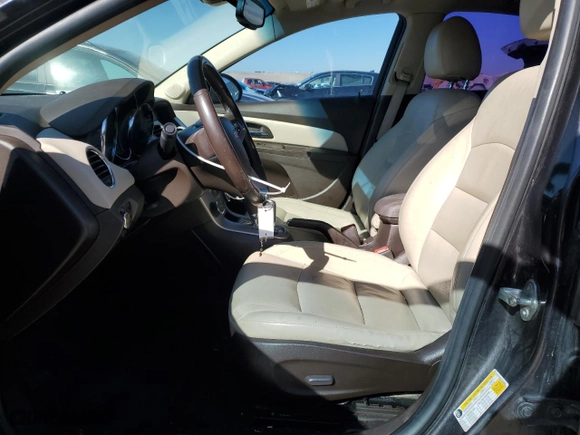 2014 Chevrolet Cruze 2LT with VIN 1G1PE5SB9E7424828, listed as a Copart auction lot 46715275 with 135,260 mi miles and Salvage Title. Bid and sale history available at carsss.com. Image 7.