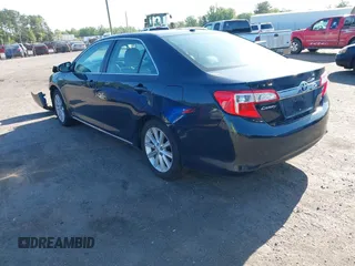 2012 Toyota Camry XLE z VIN 4T1BD1FK6CU028079, wystawiony jako IAAI lot #42142014 z przebiegiem 254 063 mil mil oraz . Historia ofert i sprzedaży dostępna na DreamBid. Obrazek 3.
