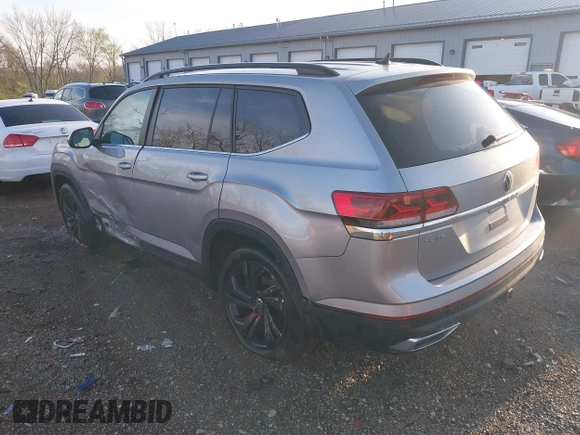 2023 Volkswagen Atlas SE with VIN 1V2HR2CA6PC523233, listed as a IAAI auction lot 41952399 with 28,387 mi miles and . Bid and sale history available at DreamBid. Image 3.