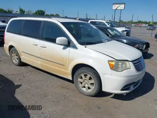 2011 Chrysler Town & Country Touring with VIN 2A4RR5DG0BR719835, listed as a IAAI auction lot 42018522 with 181,678 mi miles. Bid and sale history available at carsss.com. Image 1.
