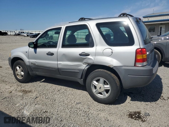 2002 Ford Escape XLS Choice with VIN 1FMYU02112KB00947, listed as a Copart auction lot 48948855 with 223,287 mi miles and Salvage title. Bid and sale history available at DreamBid. Image 2.