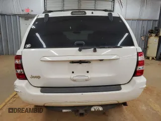 1999 Jeep Grand Cherokee Limited с VIN 1J4GW68S8XC627893, выставлен на аукционе Copart как лот 53284365 с пробегом 233 996 миль миль и Списание • Salvage title. История ставок и продаж доступна на DreamBid. Изображение 6.