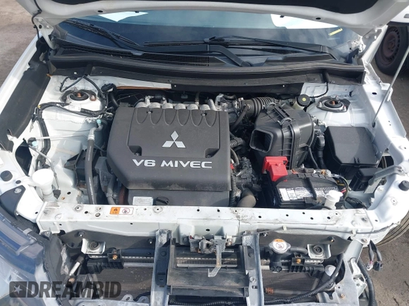 2016 Mitsubishi Outlander GT z VIN JA4JZ4AXXGZ010676, wystawiony jako IAAI lot #41527681 z przebiegiem 71 866 mil mil oraz . Historia ofert i sprzedaży dostępna na DreamBid. Obrazek 10.
