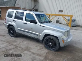 2009 Jeep Liberty Sport with VIN 1J8GN28K39W520228, listed as a IAAI auction lot 41961381 with 196,187 mi miles. Bid and sale history available at carsss.com. Image 1.