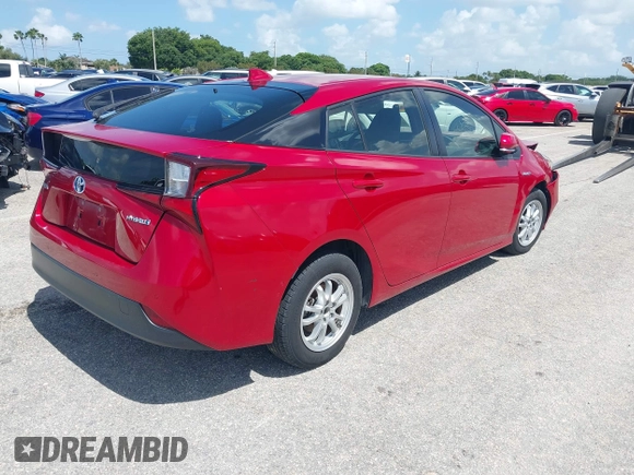 2021 Toyota Prius L Eco with VIN JTDKAMFU4M3145215, listed as a IAAI auction lot 42281566 with 74,220 mi miles and . Bid and sale history available at DreamBid. Image 4.