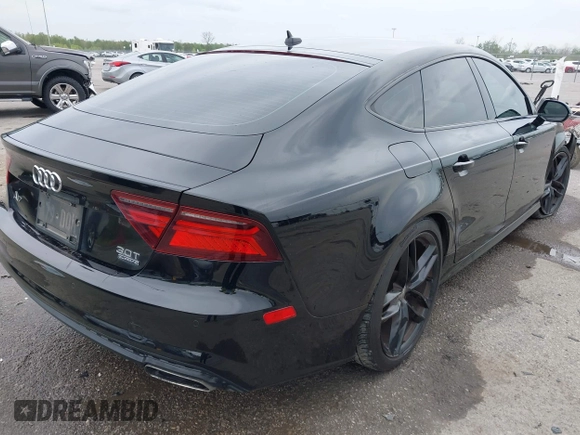 2016 Audi A7 3.0 Premium Plus with VIN WAUWGAFC5GN084310, listed as a IAAI auction lot 41888704 with 92,132 mi miles. Bid and sale history available at carsss.com. Image 4.