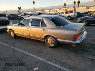 1988 Mercedes-Benz 560 with VIN WDBCA39D4JA391164, listed as a Copart auction lot 82628704 with 88,482 mi miles and Clean Title. Bid and sale history available at DreamBid. Image 2.