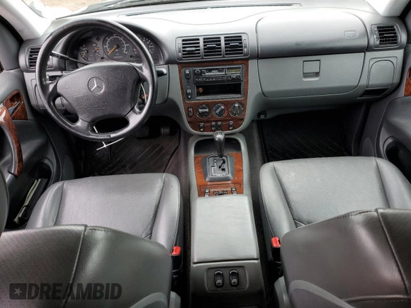 1999 Mercedes-Benz M 320/430/500 with VIN 4JGAB54E7XA078616, listed as a Copart auction lot 55301695 with 137,918 mi miles and Salvage title. Bid and sale history available at DreamBid. Image 8.